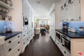 1853 Noel Pl Beverly Hills Ca 90210 Realtor Com Home White Brick Fireplace White Cabinetry