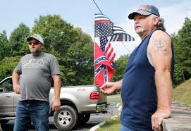 Hank williams junior's image in the middle of the battle flag — like white on rice! Protest Against Nascar Confederate Flag Ban Counterprotest Unfold With Little Drama With Photo Gallery News Annistonstar Com