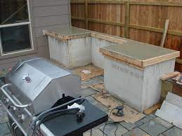 Countertops are not limited to indoor kitchen settings, which means your outdoor countertops can be tiled in a similar fashion to create your own patio or porch. Diy Outdoor Grill Stations Kitchens The Garden Glove Outdoor Kitchen Plans Build Outdoor Kitchen Outdoor Grill Station