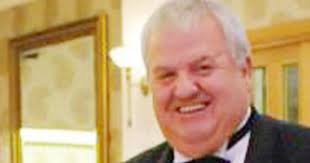 Businessman dies in freak lawnmower accident at caravan park after machine  topples onto him