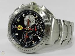 It is fastened with a red rubber strap and has a black dial. Scuderia Ferrari Watch Men S Chronograph Race Day Stainless Steel Bracelet 44mm 1787545277