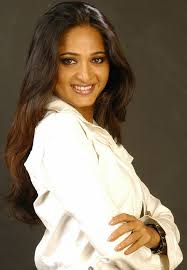 This time it was blue though. Actress Anushka Shetty Hot Thighs Show In White Short Skirt