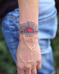 Chase stokes has a tattoo of a small smiley face located on the top of his wrist. Red Sunset Over The Mountains Tattoo Inked On The Left Outer Wrist Sonnenuntergang Tattoos Armeltatowierungen Handgelenk Tattoos Fur Manner