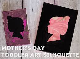 Painted walnut shells and dried peas are used to create the flower. Diy Mother S Day Toddler Art Silhouette