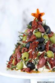 It uplifts the spirits of people during the winter and carries the refreshing scents of pine cones and spruce. Antipasto Cheese Ball Christmas Tree Cooking Carnival