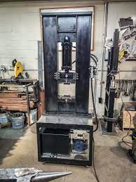Press brakes are cool machines for if you've got a hydraulic press in the shop as many do, you might consider building a press brake attachment. Hydraulic Press Build Presses Blacksmith Forums