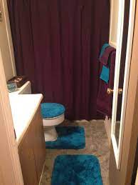 The bold maroon, purple and red colors in. Purple And Teal Bathroom Teal Bathroom Purple Bathrooms Teal Bathroom Decor