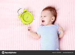Baby Crying Pink Bed Green Alarm Clock Stock Photo By C 5seconds 232426244