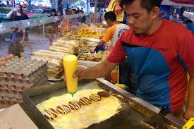There's an undeniable sense of theater that goes into making a ramly burger. How Profitable Is A Ramly Burger Stall In Singapore Business News Asiaone