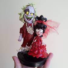 All finished up my beetlejuice and lydia cake topper. Beetlejuice And Lydia Cake Topper Halloween Wedding Cakes Beetlejuice Wedding Wedding Cake Toppers