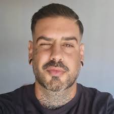 Recommendations for black and white tattoo artists?