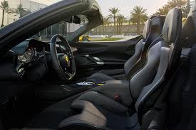 The 2018 ferrari 488 spider is a hardtop roadster, a convertible with 2 passenger doors and seating a maximum of 2 people, with a price starting at $284,650. Ferrari Sf90 Spider Review Trims Specs Price New Interior Features Exterior Design And Specifications Carbuzz