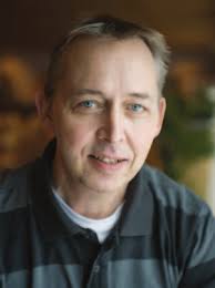 Eager beats Lazy: Improving Store Management in Eager Hardware  Transactional Memory