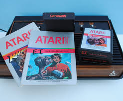 Atari Superman Raiders Of The Lost Ark And Et Atari 2600 Game Cartridges And Manuals Atari Atari 2600 Games Video Game Systems