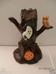 That's why this cute halloween tree is so perfect! Haunted Halloween Tree Ceramic Light Up With Set Of Spooky Tree Candle Holders 470122220