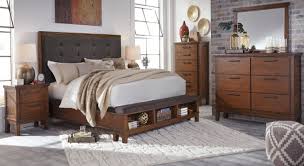 The headboard can fit either a queen or full size bed. Ashley Furniture Ralene Bedroom Collection