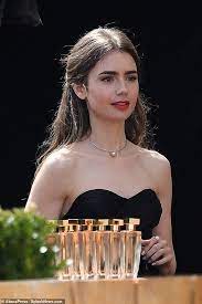Emily in paris is a new show on netflix created by darren star. Lily Collins Films Her Upcoming Tv Drama Emily In Paris With Her French Co Star Daily Mail Online