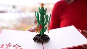 A festive blooming cactus is draped in bright holiday lights. Christmas Cactus Pop Up Card Youtube