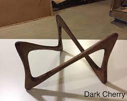 It has a square tabletop supported by a trapezoidal block base. Mid Century Coffee Table Etsy