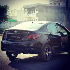 Hyundai Verna Fluidic Hyundai Scorpio Car Photo Poses For Boy