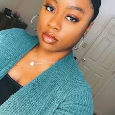 Is one million fifty-one thousand two hundred ounces of coffee an Olympic  size swimming pool?