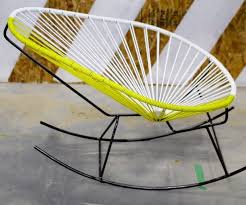 A Woven Mexican Rocking Chair Rocking Chair Gallon Of Paint Chair