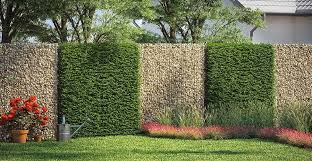 Garten Mit Einer Gabionenmauer Mit Hecken Elementen Davor Ein Blumenbeet If You Have A Small Yard The Last Thing You Want Is To Stuff H In 2020 With Images Front Garden Design