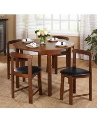 Set includes counter height dining table and 4 upholstered bar stools; Savings On Simple Living 5 Piece Tobey Compact Dining Set 5 Piece Tobey Compact Dining Set Black
