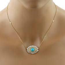 Pavé black and white diamonds with blue sapphire. 18k Gold Baguette Diamond Turquoise Gemstone Evil Eye Necklace Jewelry Artisan Wolf Badger
