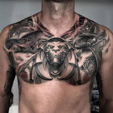 What the ancients called a clever fighter is one who not only wins, but excels in winning at ease. gladiator tattoo. Gladiator Themed Chest Piece