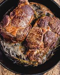 Rib eye steak cooked in skillet. Cooking Ribeye Steak Tender And Juicy Every Time Sip And Feast