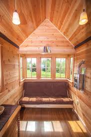 You could actually have two people. Jadetinyhouse Great Room Couch Bed Taproot Architects Llc