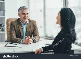 the two business people talking at the office table ad sponsored people business talking table business people office table photo editing