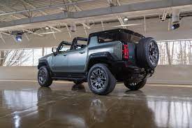 That roof has to go someplace when it's open, and that's usually right to where the rear seat passengers keep their foreheads. 830 Hp 2024 Gmc Hummer Ev Suv Is An Open Roof Off Roader