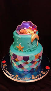 This 2 tiered fondant cake is topped with a cute little sail boat, decorated with lifesavers, anchor and water just to. Mermaid Baby Shower Cake Cakecentral Com