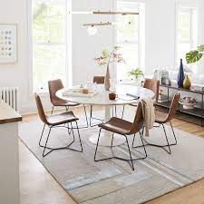Find the perfect home furnishings at hayneedle, where you can buy online while you explore our room designs and curated looks for tips, ideas & inspiration to help you along the way. Slope Leather Dining Chair West Elm Round Dining Room Round Marble Dining Table Dining Chairs