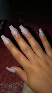 The nails are all light purple but three are covered in glitter and the other two have a beautiful rhinestone design. Buy Amazon Amzn To 31bcjok Purple With Gray Undertone Coffin Nails Coffin Nails Purple Undertone Purple Nails White Acrylic Nails Cute Acrylic Nails