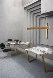 The tables support each other in a way that would not be possible if they were apart, giving the name pangea. Pangea Baxter Tables