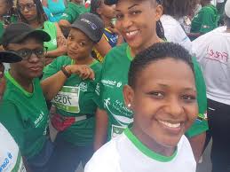 Mwenyekiti wa Bodi ya COSOTA Bw. Victor Tesha (wanne kushoto) na Afisa  Mtendaji Mkuu na Msimamizi wa Hakimiliki Bi.Doreen Anthony Sinare akiwa  katika picha ya pamoja na Maafisa wa COSOTA katika Tamasha