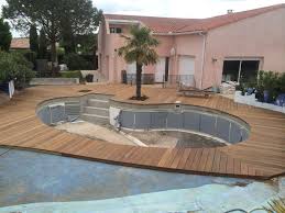 superbe renovation autour d une piscine en forme de haricot ref artisan n 151 a auzie piscine amenagement paysager terrasse bois piscine terrasse piscine