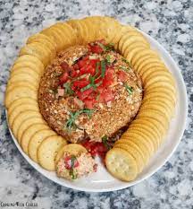 Bruschetta cheese ball takes just minutes to whip up and is always a total show stopping appetizer! Bacon Bruschetta Cheese Ball Cooking With Carlee