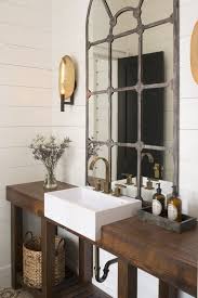 Rustic Industrial Bathroom With A Drak Stained Reclaimed Wood Vanity And A Shelf For St Industrial Bathroom Design Modern Farmhouse Bathroom Rustic Powder Room