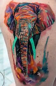Elephant with colorful butterfly tattoo design for the back. 15 Best Elephant Tattoo Designs With Images Styles At Life