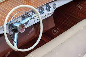 The uflex line of steering wheels include the high range series, yacht steering wheels and many other quality uflex steering wheels. Steering Wheel And Leather Seats In A Luxury Wooden Motor Boat Stock Photo Picture And Royalty Free Image Image 17501001