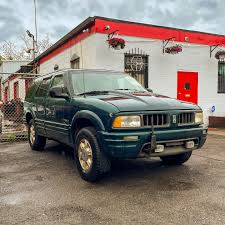 Image result for Scaraba Green 1930 Oldsmobile