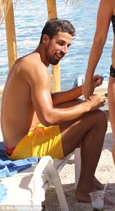 The duo are holidaying on the greek island with bayern star robert. Adriana Lima Sizzles In A Red Bikini On A Mykonos Beach With Sami Khedira Daily Mail Online