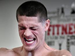 Trainer Anthony Comer helps stabbing survivor Corey Andrade recover