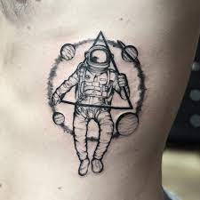 Love it 1 « previous 1 2 3 next » last » black shaded astronaut and universe tattoo on upper sleeve. Spaceman Tattoo Astronaut Tattoo Tattoo Designs Men Tattoos