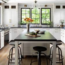 While coming to the extreme end of the color spectrum from white, it's black. White Cabinets With Black Countertops Houzz