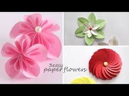 Cupcake papers are like ready made flowers as you have to flowers are always the most heart warming gift and now you can make them yourself at home to add more value and touch wood to them using red. 3 Easy Paper Flowers Youtube Paper Flowers Paper Flowers Diy Easy Paper Flower Tutorial